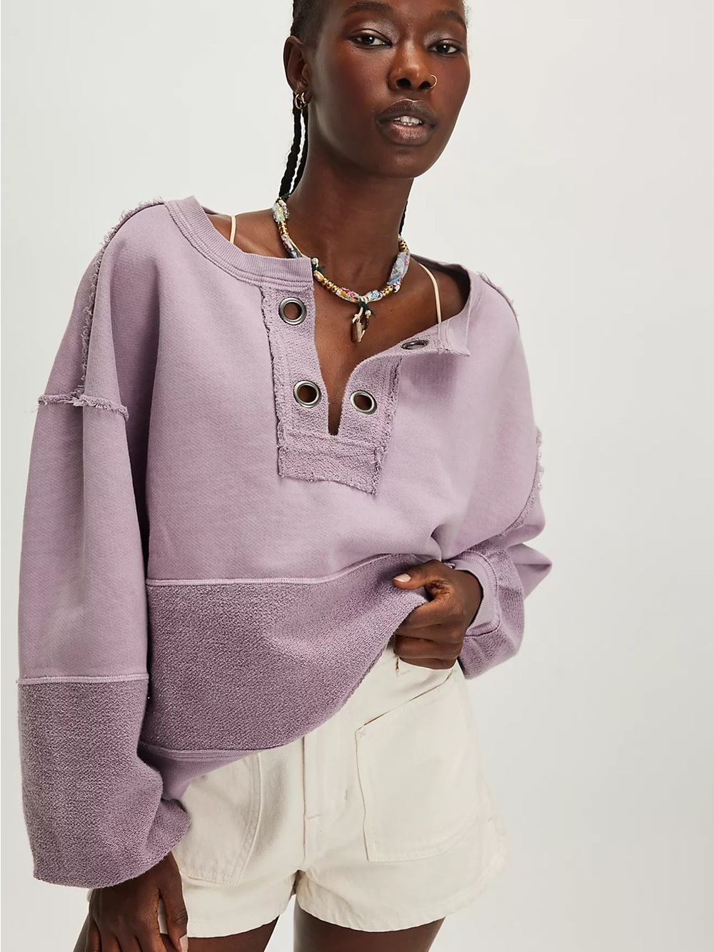 We The Free Running Wild Solid Pullover  in lavender size large in EUC